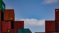 Colorful artistic stack of steel cargo containers